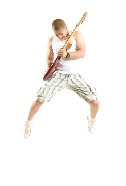 Namiętny gitarzysta skacze — Zdjęcie stockowe