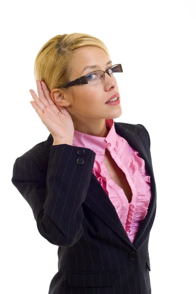 Woman cupping hand behind ear — Stockfoto