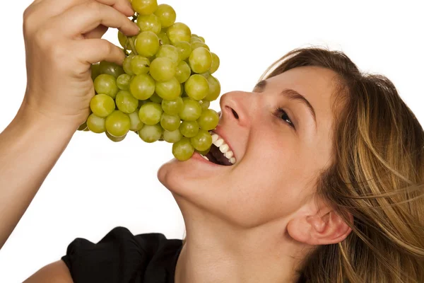 stock image Young woman holding green fruit over white backg