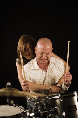 Woman drummer playing clipart