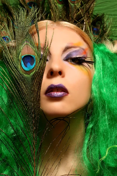 Fashion girl-peacock with green hair — Stock Photo, Image