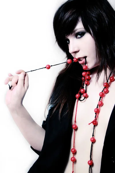 Fashion girl in red beads — Stock Photo, Image