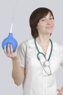 Nurse with enema is flirting clipart