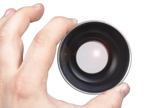 Lens in a hand — Stock Photo, Image