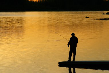 gün batımında balıkçılık