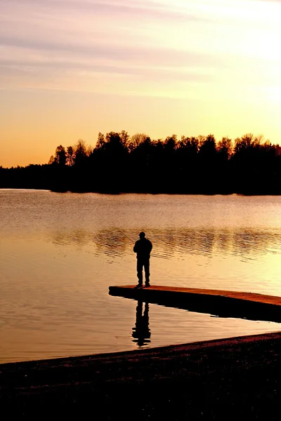 Fishing at sunset — Stock Photo, Image