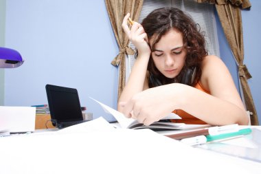 Teenage girl reading a book clipart