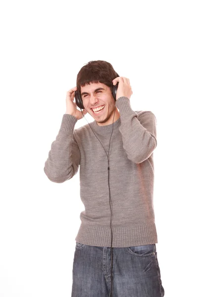 Joven escuchando música — Foto de Stock