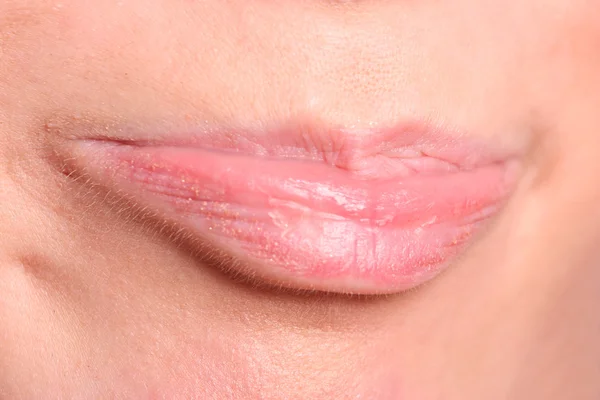 Labios rosados de mujer joven —  Fotos de Stock