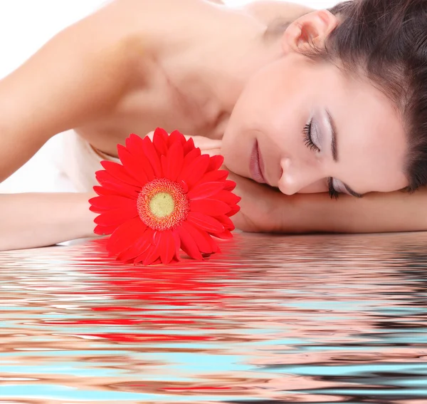 Nő virággal szerzés spa kezelés — Stock Fotó