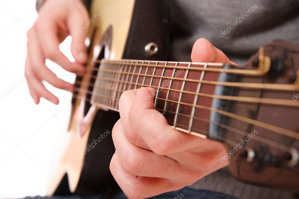 Guitarist hand playing guitar