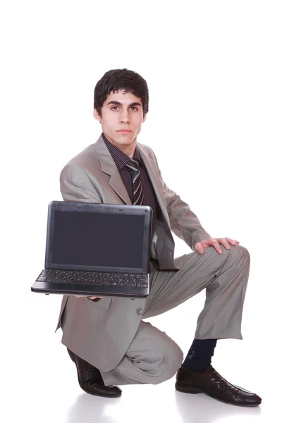 Деловой человек с ноутбуком — стоковое фото