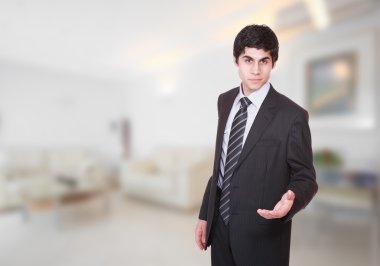 Male hotel manager in the lobby clipart