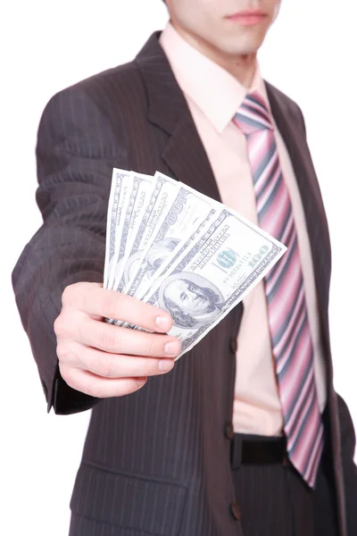 Un homme d'affaires tient de l'argent dans une main — Photo