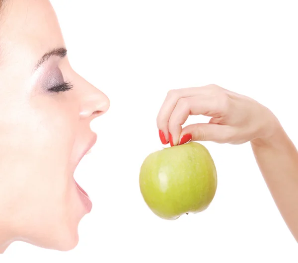 A pretty young woman holding an apple — Stock Photo, Image