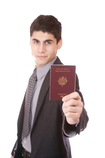Un hombre de negocios con traje tiene pasaporte. — Foto de Stock