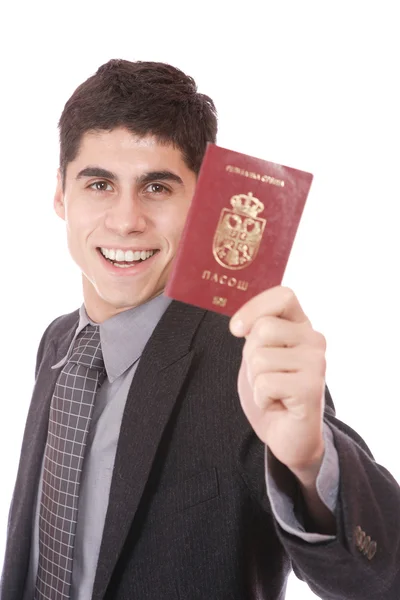 Un uomo d'affari in giacca e cravatta ha il passaporto — Foto Stock
