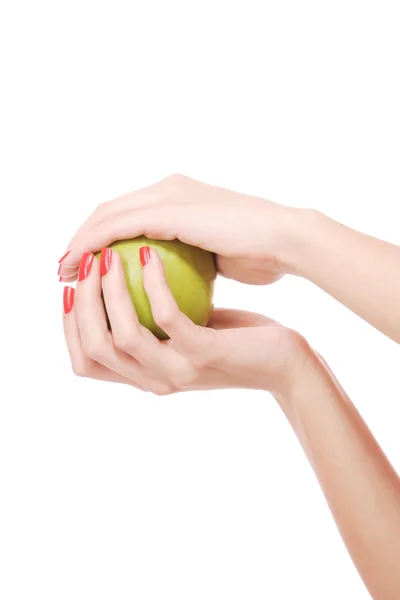 Čerstvé zelené jablko v ruce — Stock fotografie