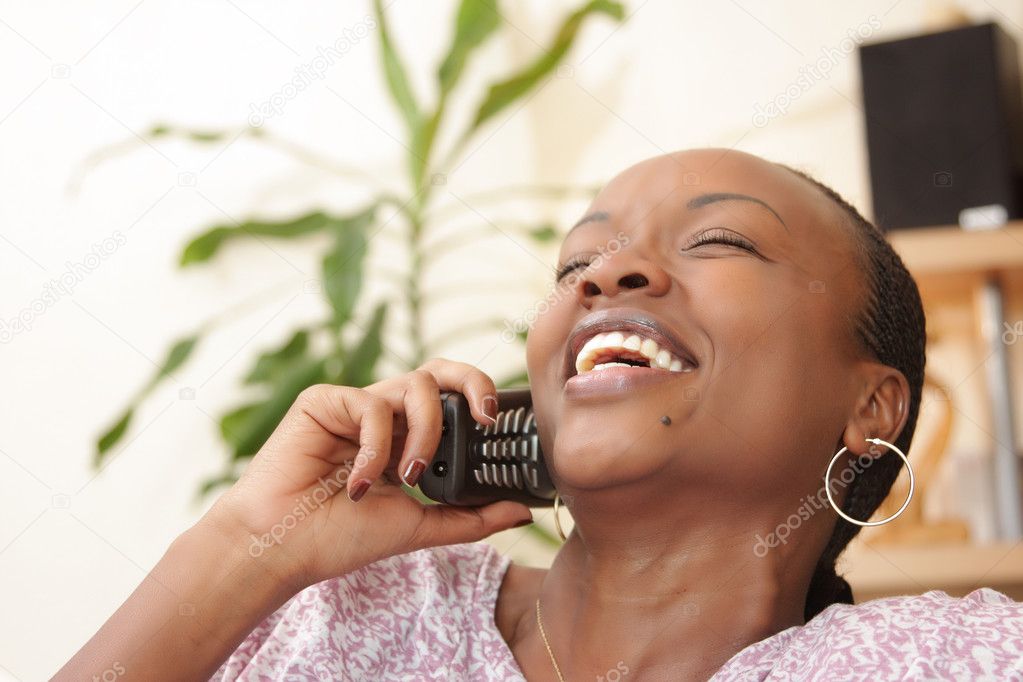 Picture of a happy woman on the phone
