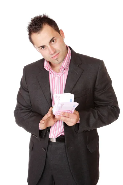 Portrét muže obchodní drží peníze — Stock fotografie