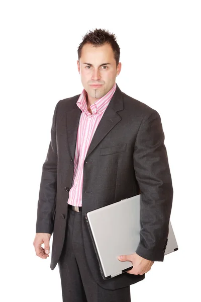 Happy businessman holding laptop computer — Stock Photo, Image