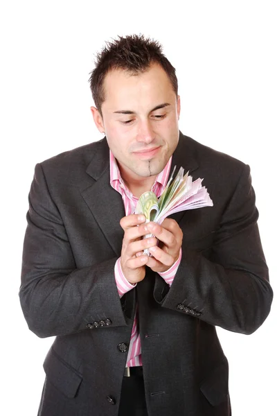 Portret człowieka biznesu, trzymając pieniądze — Zdjęcie stockowe