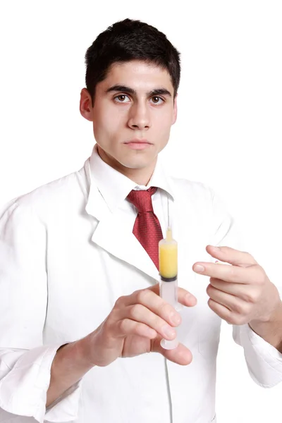 Arzt hält Spritze — Stockfoto