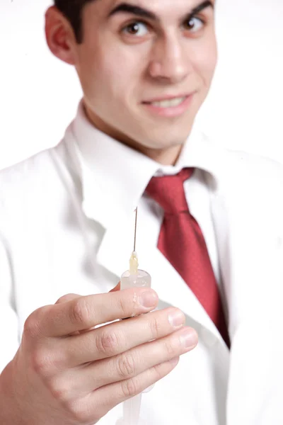 Läkare som håller sprutan — Stockfoto