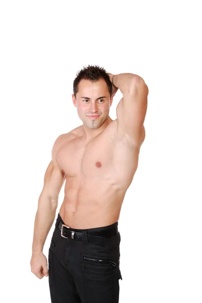 Сексуальный мускулистый мужчина изолирован на белом — стоковое фото