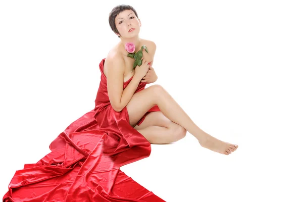 Menina bonita em um vestido vermelho longo — Fotografia de Stock