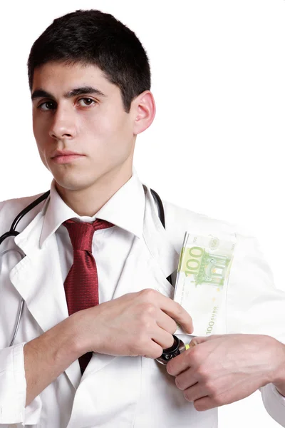 Doctor con billetes de 100 dólares —  Fotos de Stock