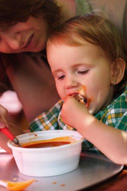 Child eating clipart