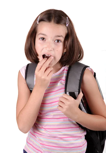 Young girl eating chocolate — Stock Photo, Image