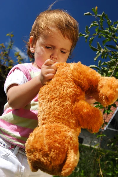 Playing with teddy bear — Stock Photo, Image
