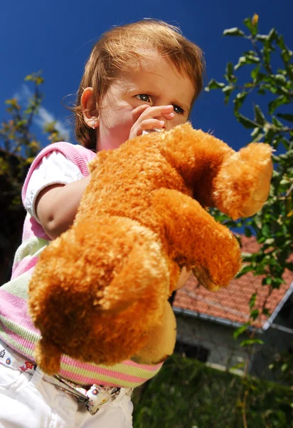 Playing with teddy bear — Stock Photo, Image