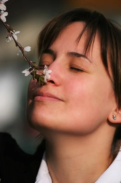 Smelling flower — Stock Photo, Image