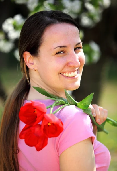Pretty women with tulips — Stock Photo, Image