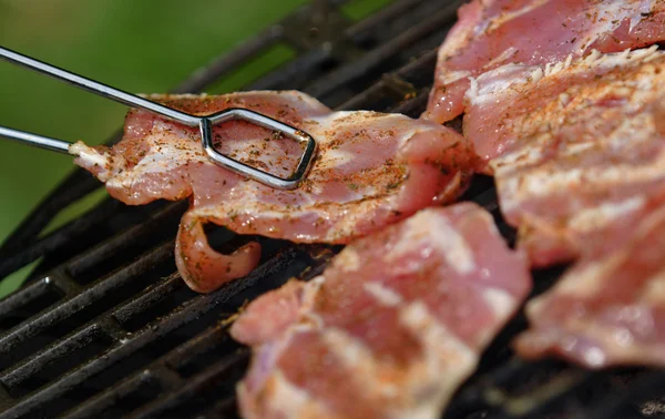 Grilling spiced pork meat — Stock Photo, Image