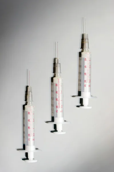 Three medical syringe — Stok fotoğraf