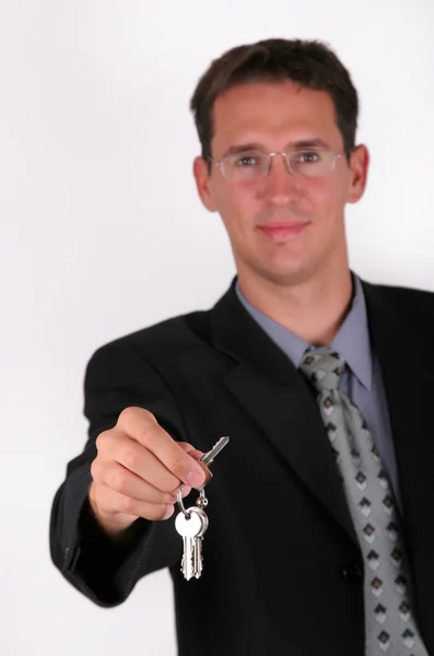 Business man with key — Stock Photo, Image