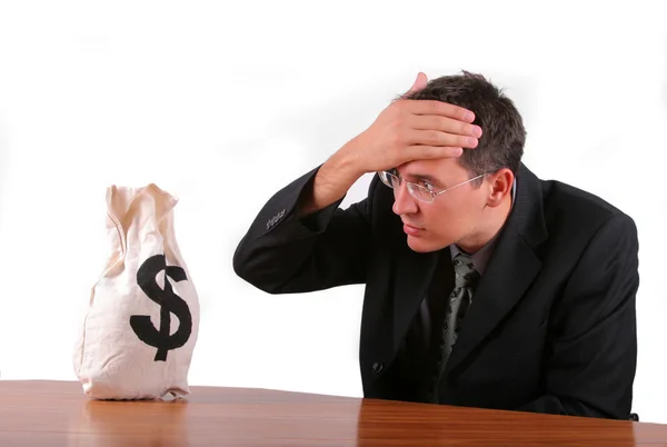Business man looking worried his money bag — Stock Photo, Image