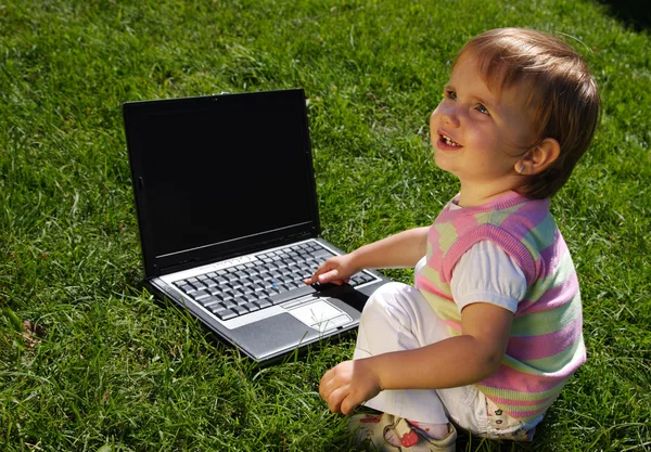 Child with laptop Stock Picture