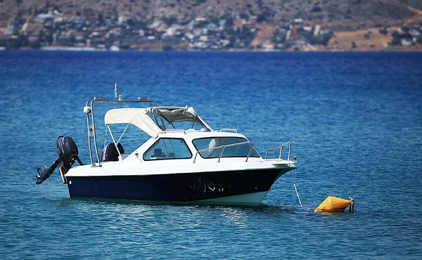 stock image Small motorboat on the sea