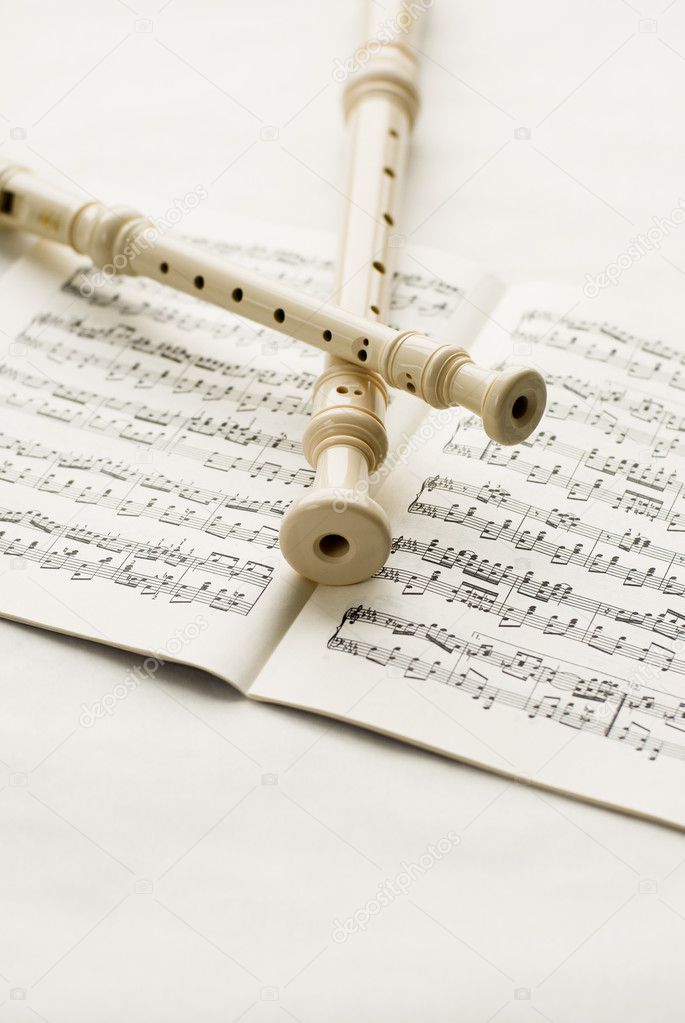 Flutes over musical notes