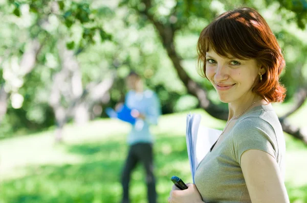 Red haired in a park — Stock Photo, Image