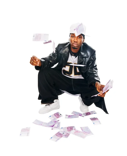 Handsome hip-hop young man with cash on white — Stock Photo, Image