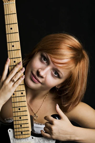 Red-haired girl with guitar — Stock Photo, Image