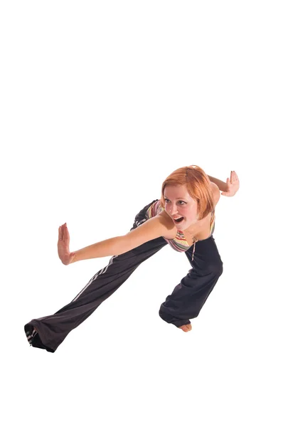 Red haired girl performing fitness exercises — Stock Photo, Image