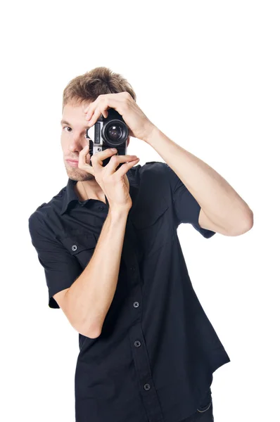 カメラを持った若い男が — ストック写真