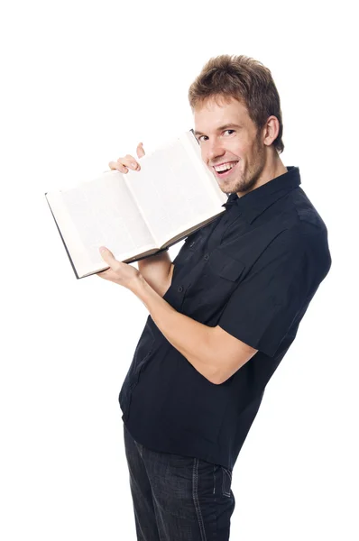 Jonge man aan te tonen een boek — Stockfoto